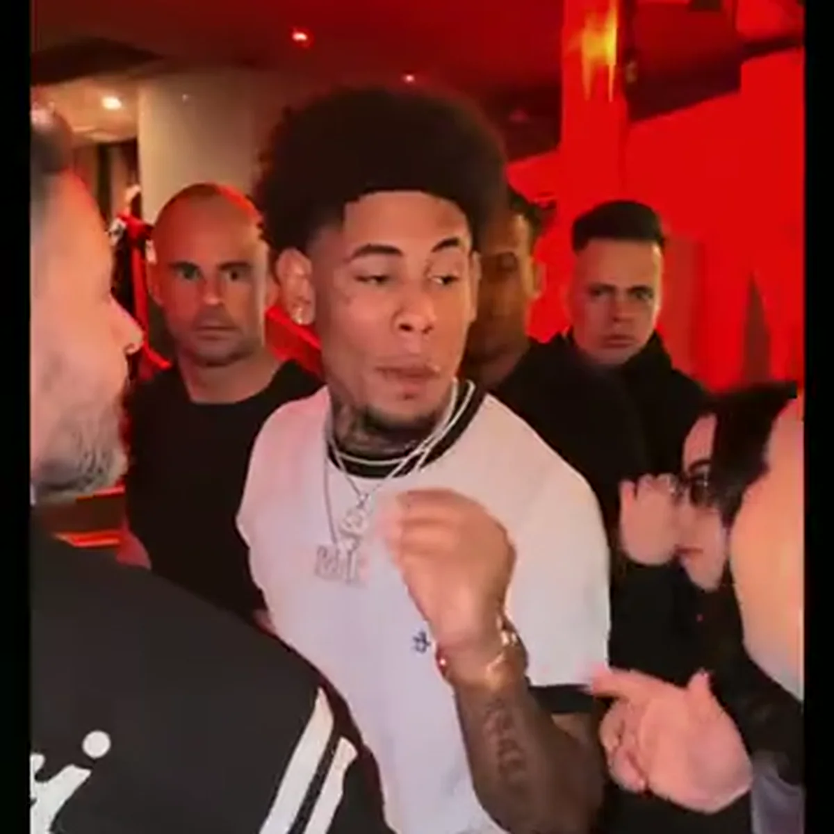 Still frame from a TikTok Bulin 47 trend video by @srjimenez_fan showing a performer in a red-lit room